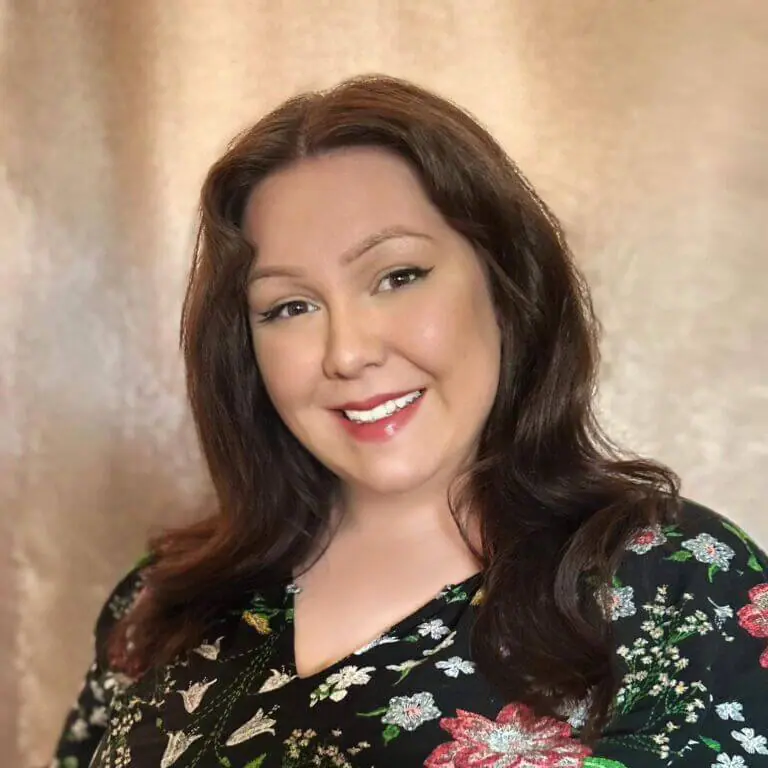 Smiling woman with long brown hair
