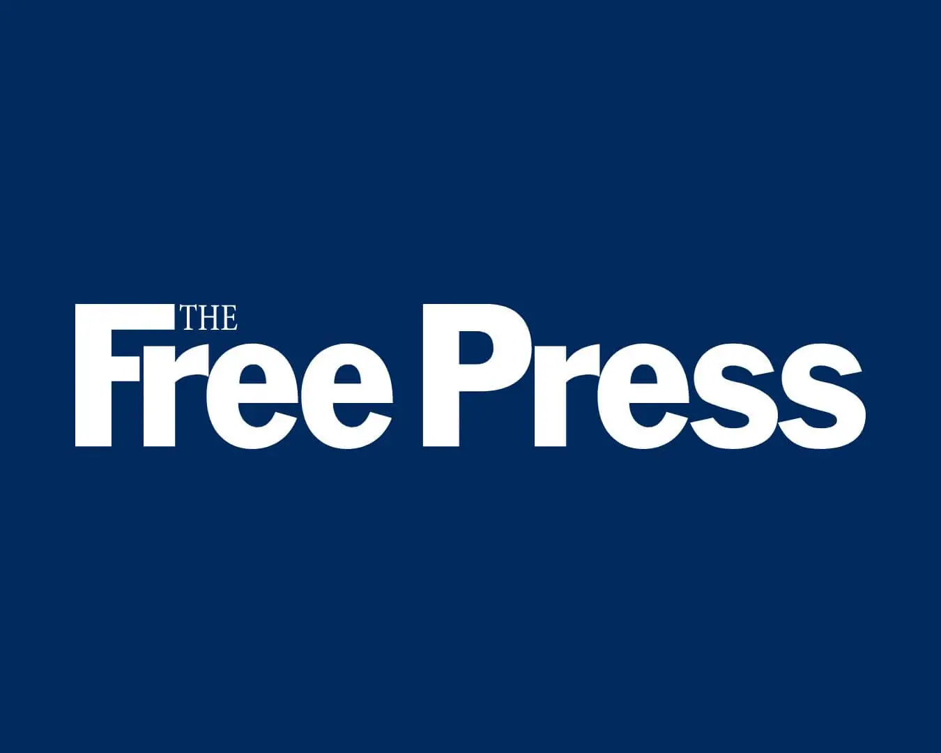 Free Press emblem in white letters