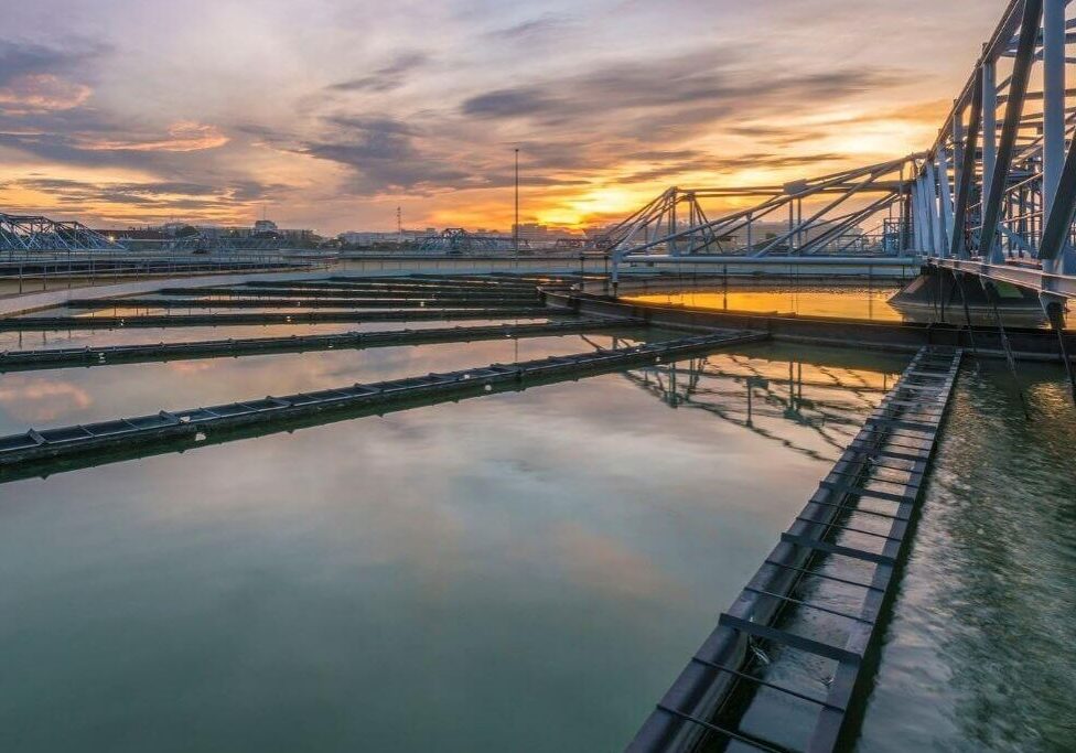 Water treatment facility at sunset