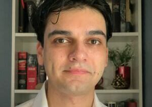 Person wearing a white shirt indoors