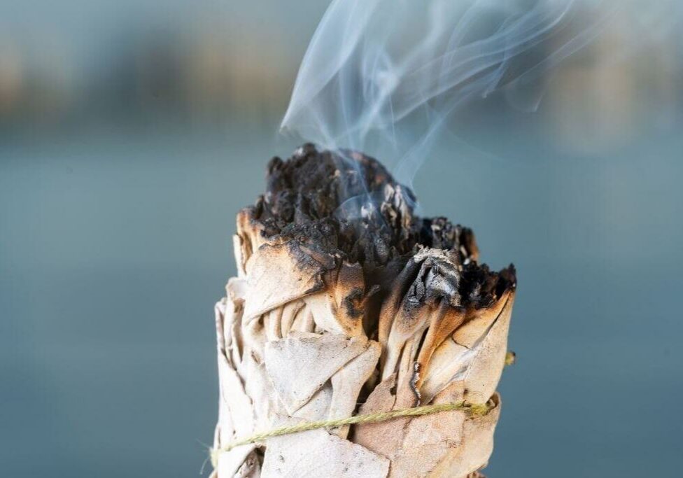 Sage stick releasing smoke