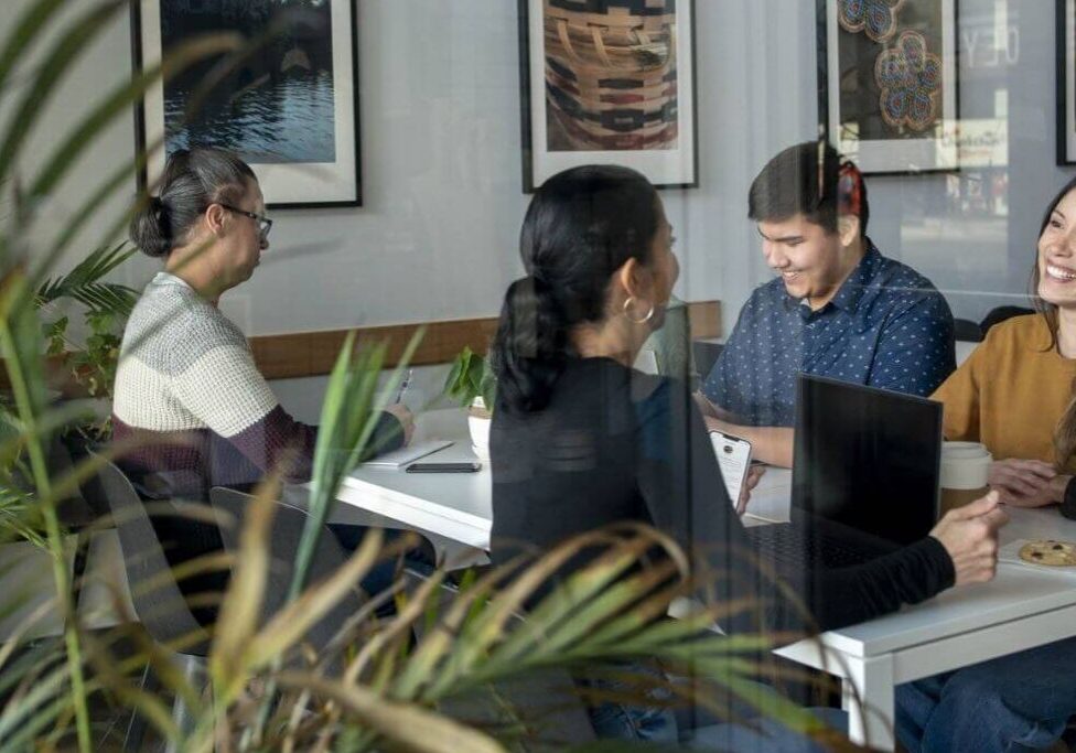 Group working in a cozy café