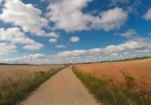 Open countryside with clouds and path