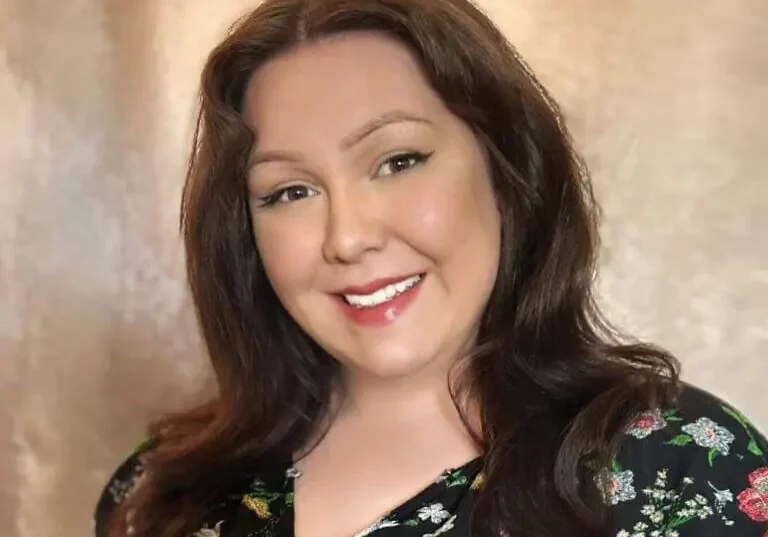 Smiling woman with long brown hair