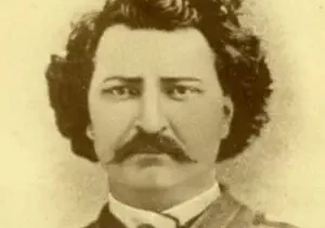 Black and white photo of a serious man