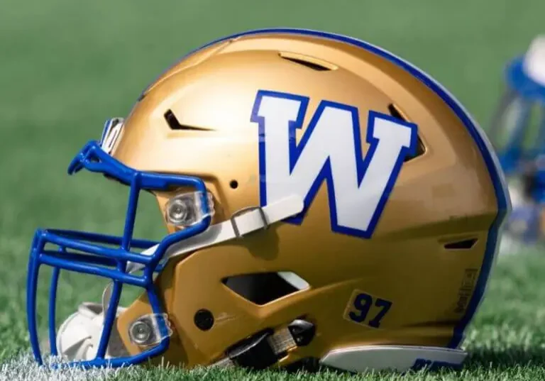 Golden helmet with blue "W" logo